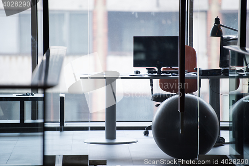 Image of empty office with modern computers