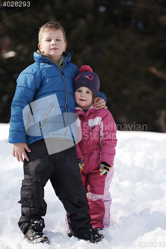 Image of Brother and sister portrait in winter time