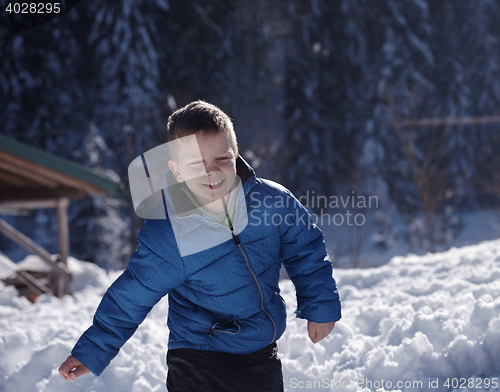 Image of kids playing with  fresh snow