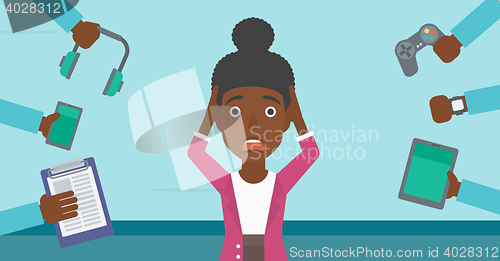 Image of Woman surrounded with her gadgets.