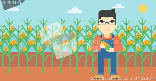 Image of Farmer holding corn vector illustration.