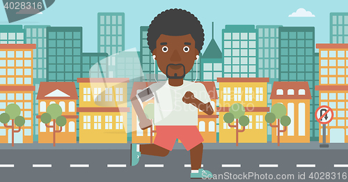 Image of Man running with earphones and smartphone.