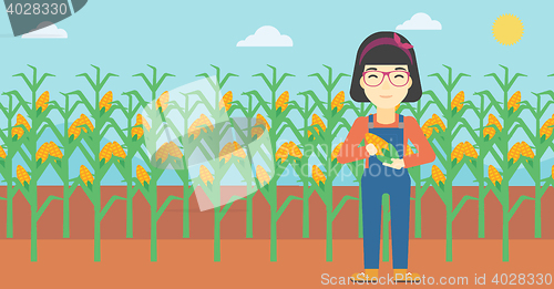 Image of Female farmer holding corn vector illustration.