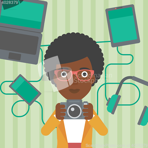 Image of Woman surrounded with her gadgets.