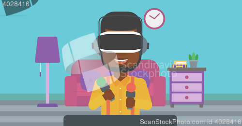 Image of Man in virtual reality headset playing video game.