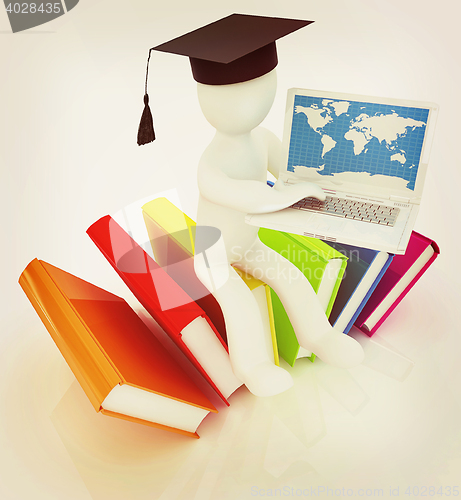 Image of 3d man in graduation hat sitting on books and working at his lap