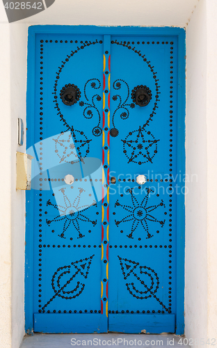 Image of Blue door with ornament from Sidi Bou Said