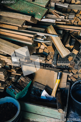 Image of Stack of dry firewoods indoor