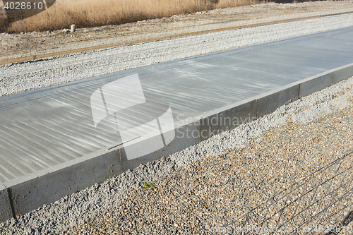 Image of New concrete road barriers metal mesh