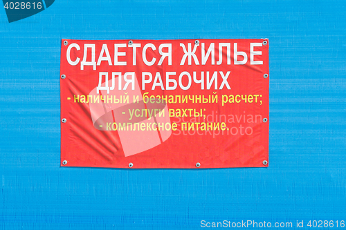 Image of A sign on the wall \"shall be accommodation for the workers\"