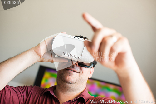 Image of Man wearing VR glasses