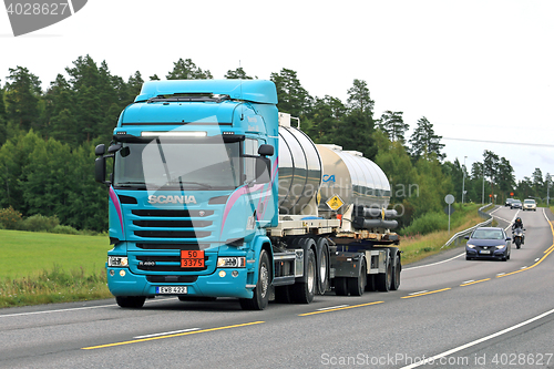 Image of Turquoise Scania Tank Truck ADR Transport on the Road