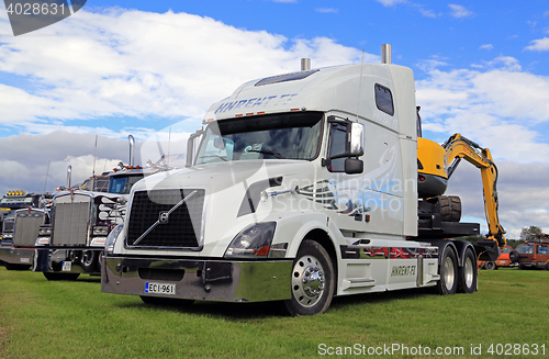 Image of White Volvo VNL 64T and other Conventional Show Trucks