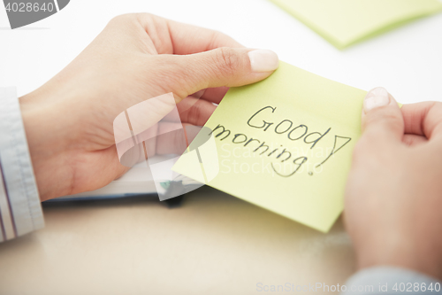 Image of Good morning text on adhesive paper