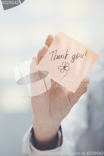 Image of Thank you text on adhesive note