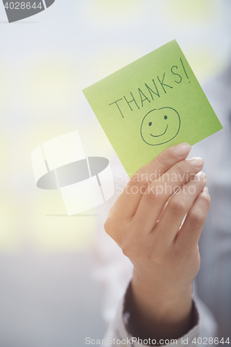 Image of Thanks text on adhesive note