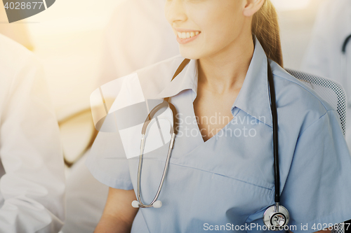 Image of close up of doctor with stethoscope at seminar