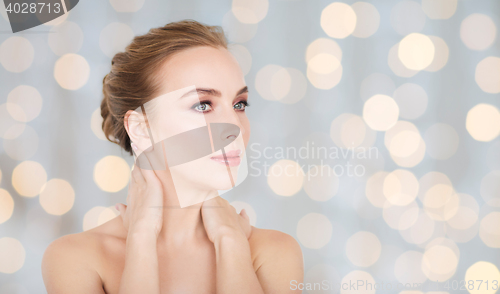 Image of beautiful young woman face and hands