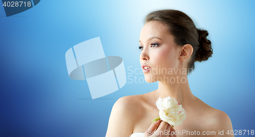 Image of beautiful asian woman with flower and jewelry