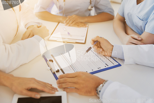 Image of close up of doctors with clipboards at hospital