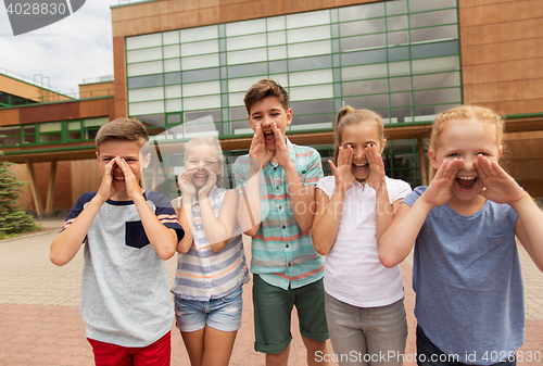 Image of group of happy elementary school students