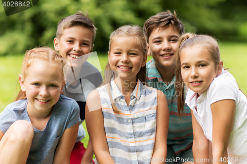 Image of group of happy kids or friends outdoors