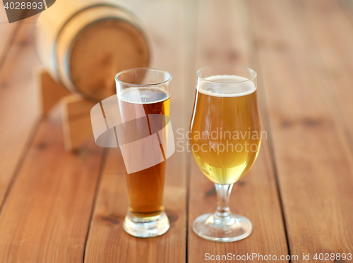 Image of close up of different beers in glasses on table