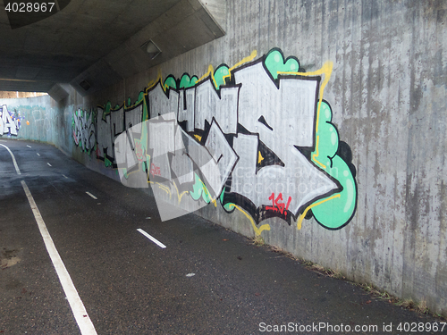 Image of one tunnel full of grafitti 