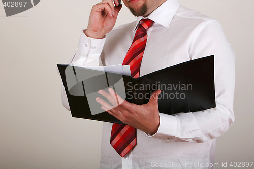 Image of businessman reading