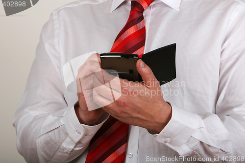 Image of person holding pda