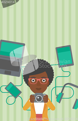 Image of Woman surrounded with her gadgets.