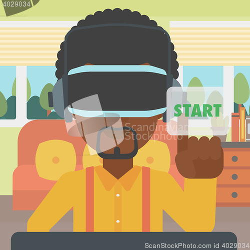 Image of Man wearing virtual reality headset.