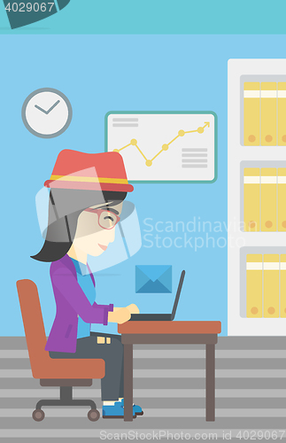 Image of Business woman receiving or sending email.