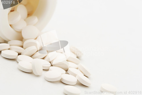 Image of flowing pills