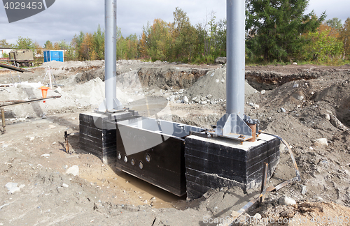 Image of Metal and concrete structures are assembled for installation