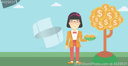 Image of Business woman catching dollar coins.