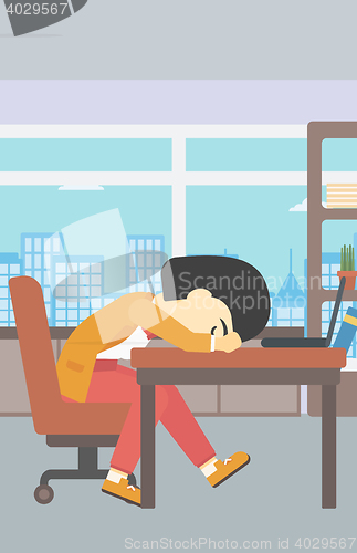 Image of Woman sleeping on workplace.