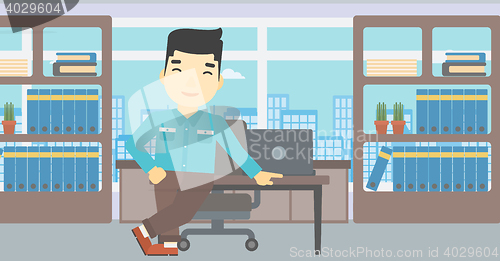 Image of Businessman standing in the office.