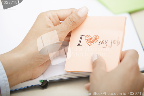 Image of Love my job text on adhesive note