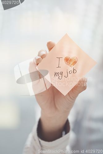 Image of Love my job text on adhesive note