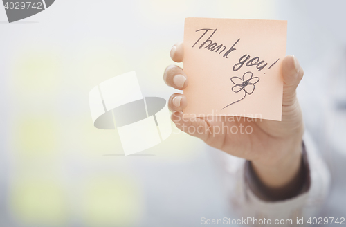 Image of Thank you text on adhesive note