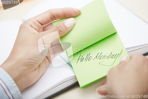 Image of Hello Monday text on adhesive note