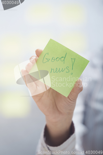 Image of Good news text on adhesive note