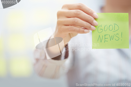 Image of Good news text on adhesive note