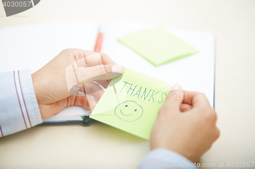 Image of Thanks on adhesive note