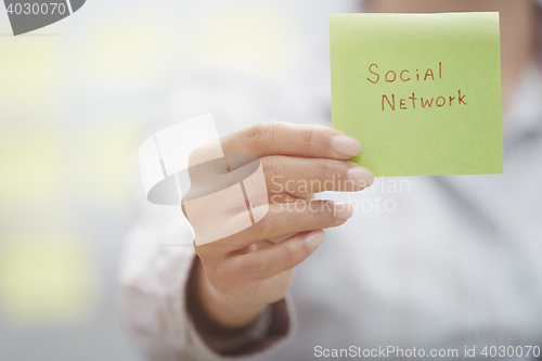 Image of Social network text on adhesive note