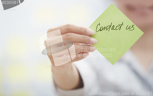 Image of Contact us on adhesive note