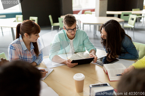 Image of group of high school students with tablet pc