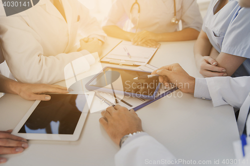 Image of group of doctors meeting at hospital office