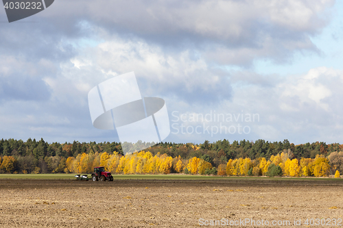 Image of tractor in a field